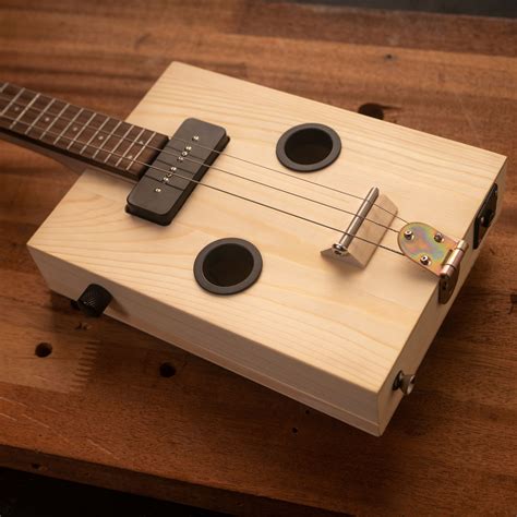 how to make a cigar box electric guitar|one string cigar box guitar.